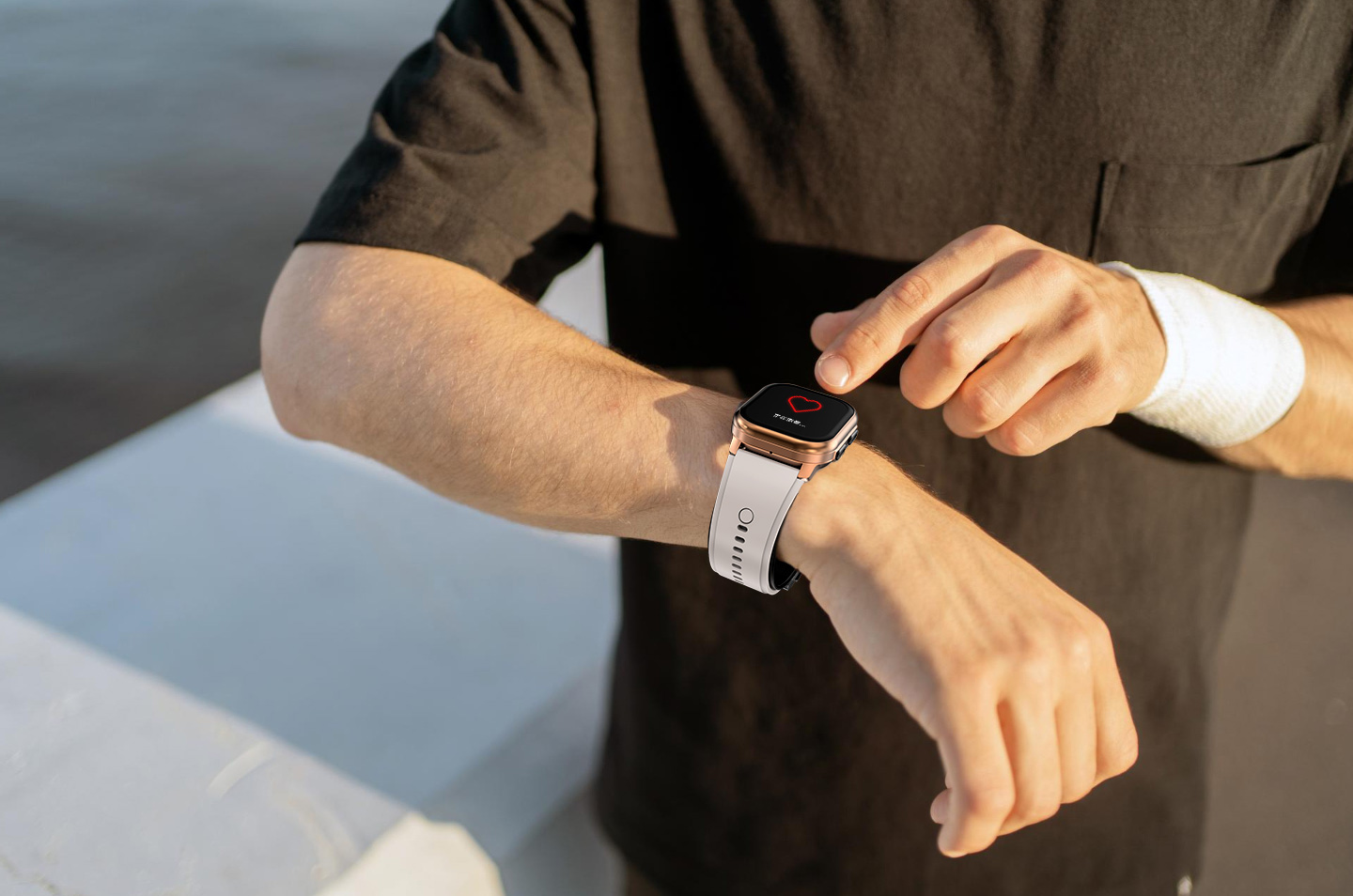 A person interacting with a connected health wearable