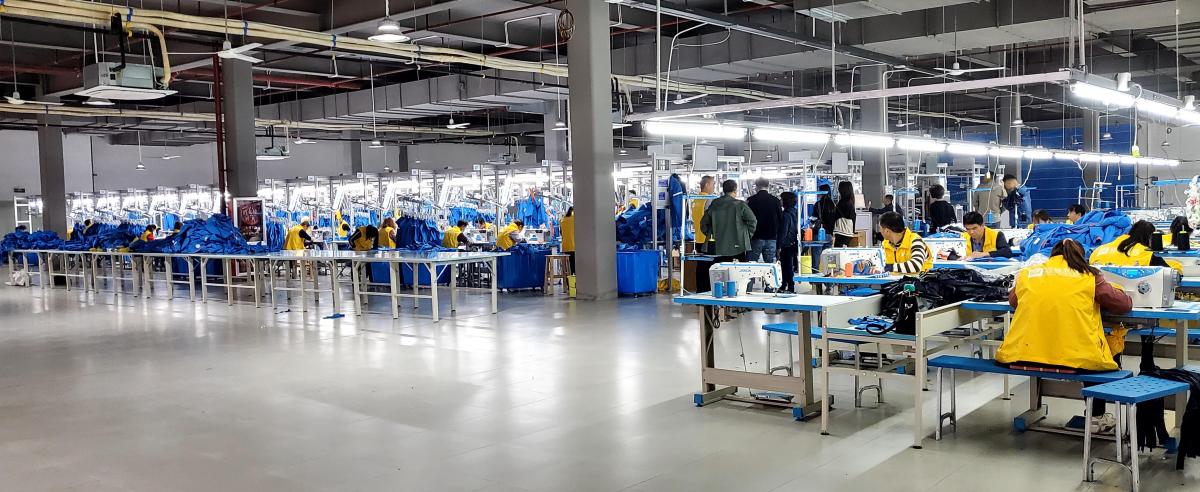 Pertemba garment production floor showing the manufacturing environment for custom development
