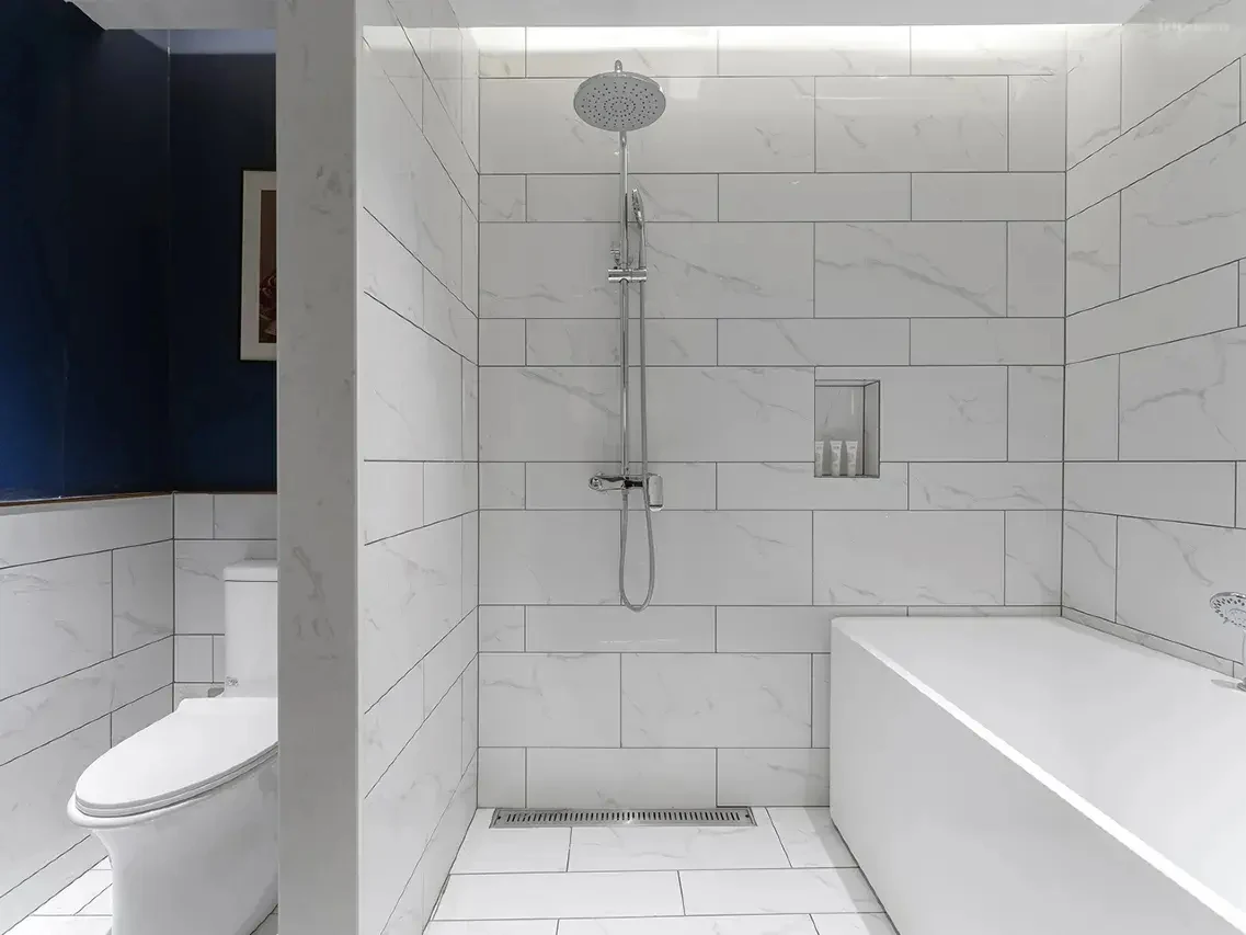Hotel guest bathroom shower area