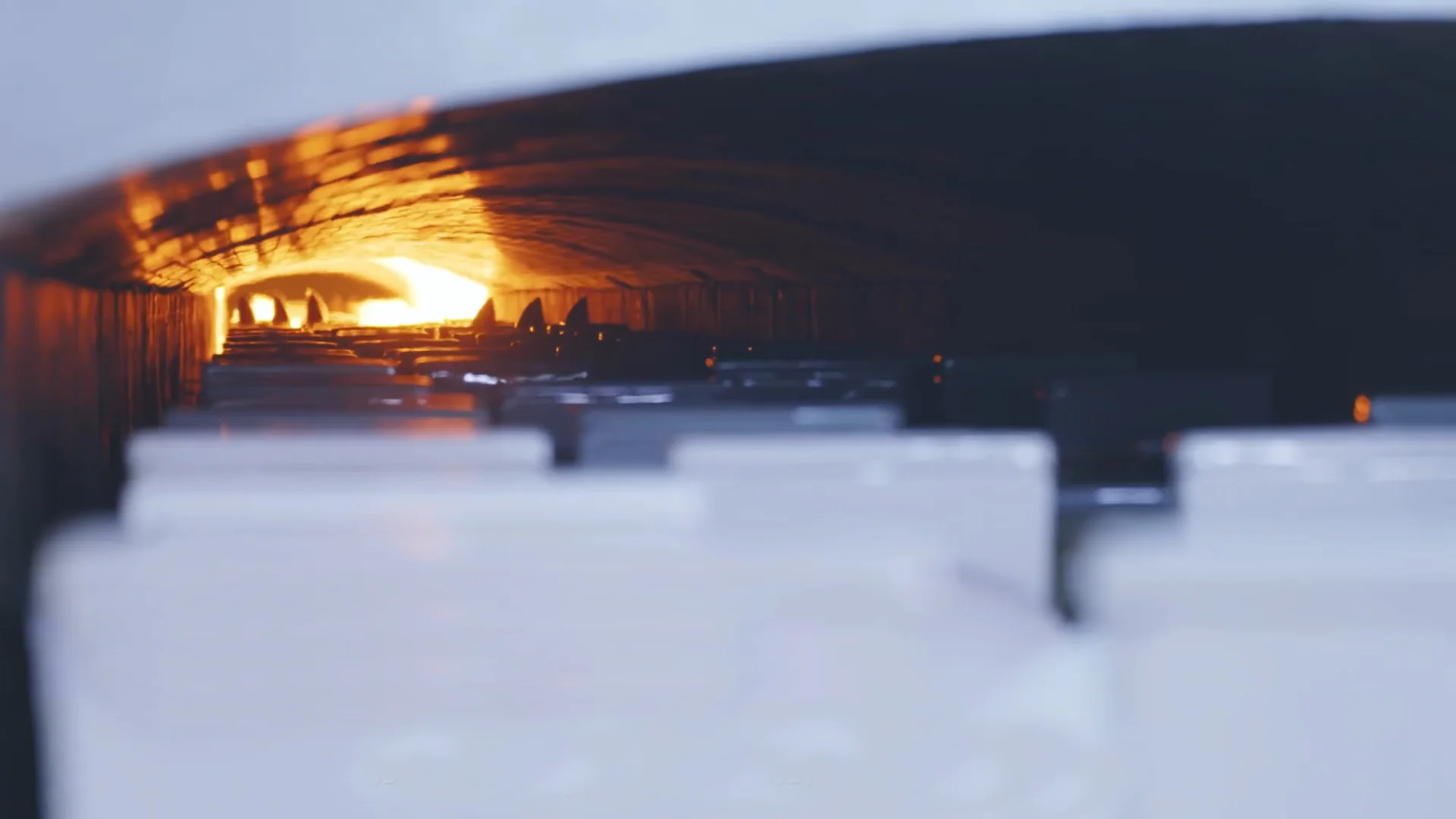 Ceramic sanitary ware firing inside a tunnel kiln