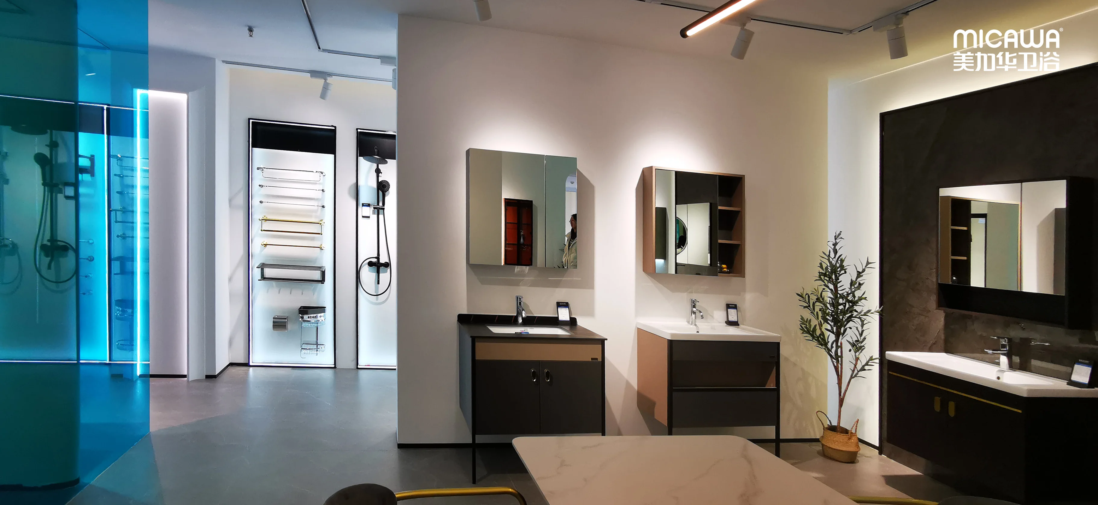 MICAWA dealer showroom displaying bathroom vanities, shower systems and coordinated collections
