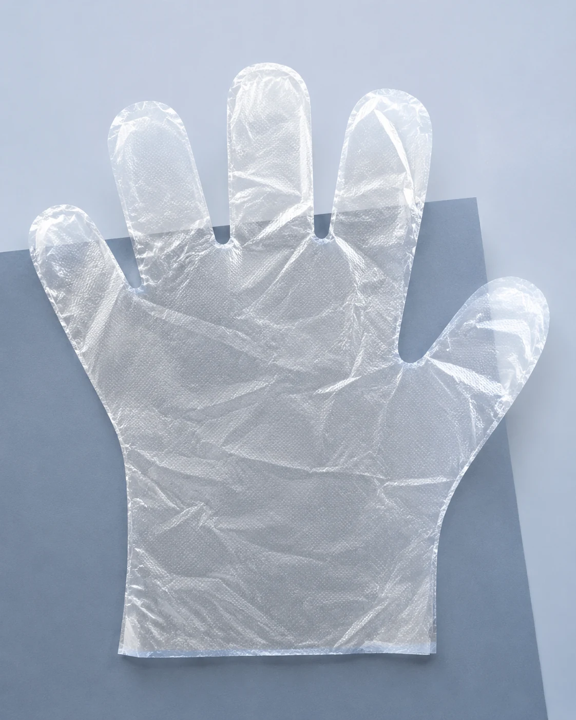 Clear lightweight HDPE disposable film glove