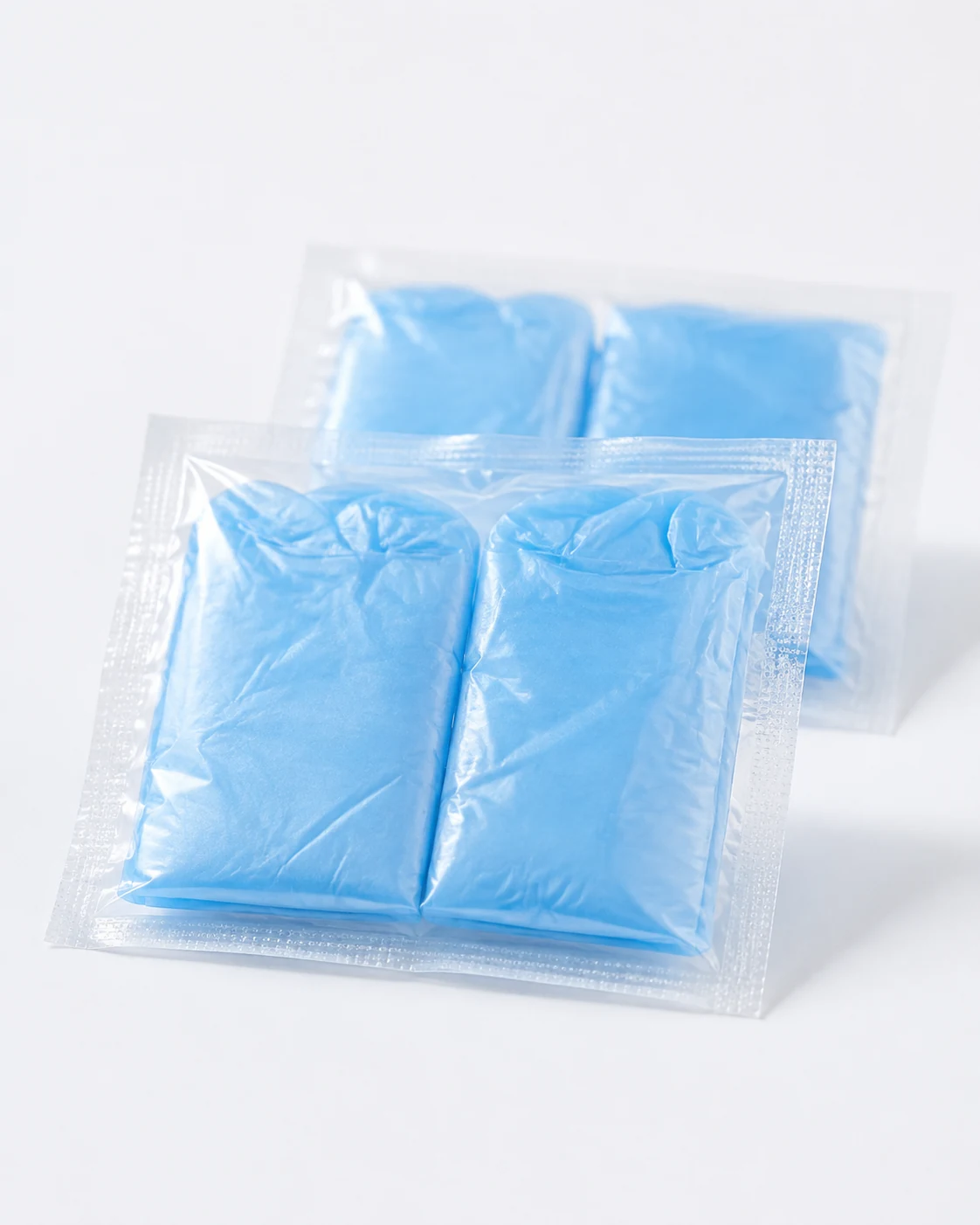 透明なブランドのない小袋で一緒に密封された2つの折り畳まれたPE手袋