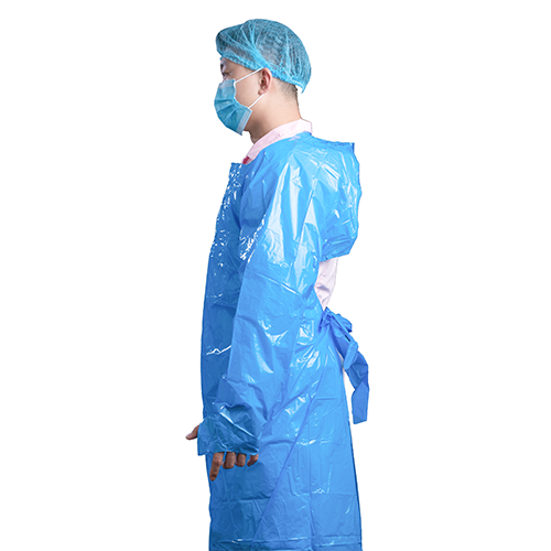 Side view of a blue disposable CPE gown and waist-tie closure
