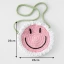 A round smiling face cross-body bag