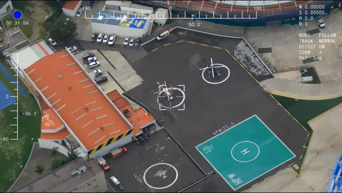 Aerial inspection view of an industrial site and marked operating areas.