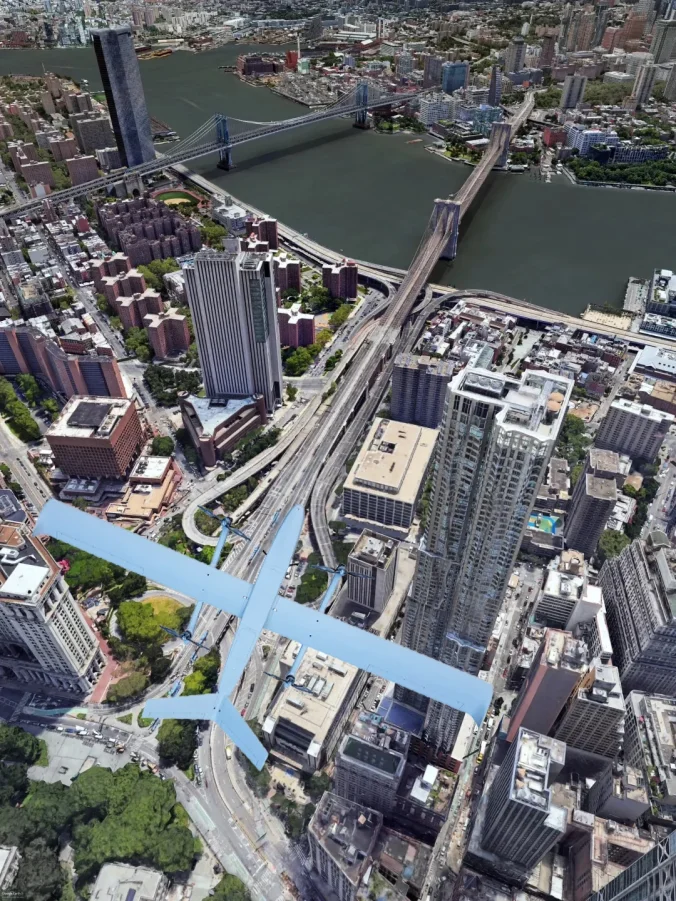 XJ-TR1 VTOL UAV collecting aerial data above an urban corridor.