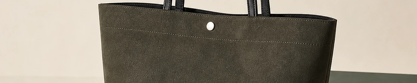 BLOOM-106 close-up showing moss suede-look surface and shopper construction