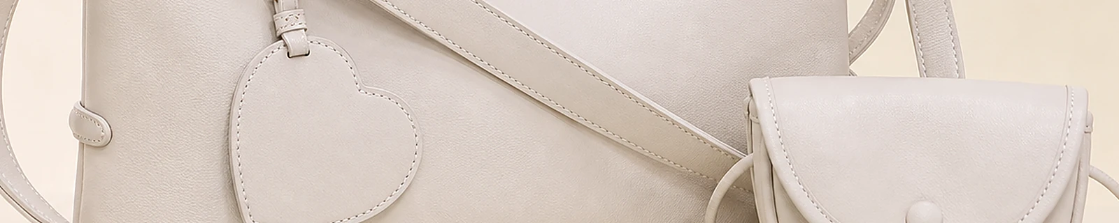 BLOOM-504 close-up showing ivory mini hobo body and strap details