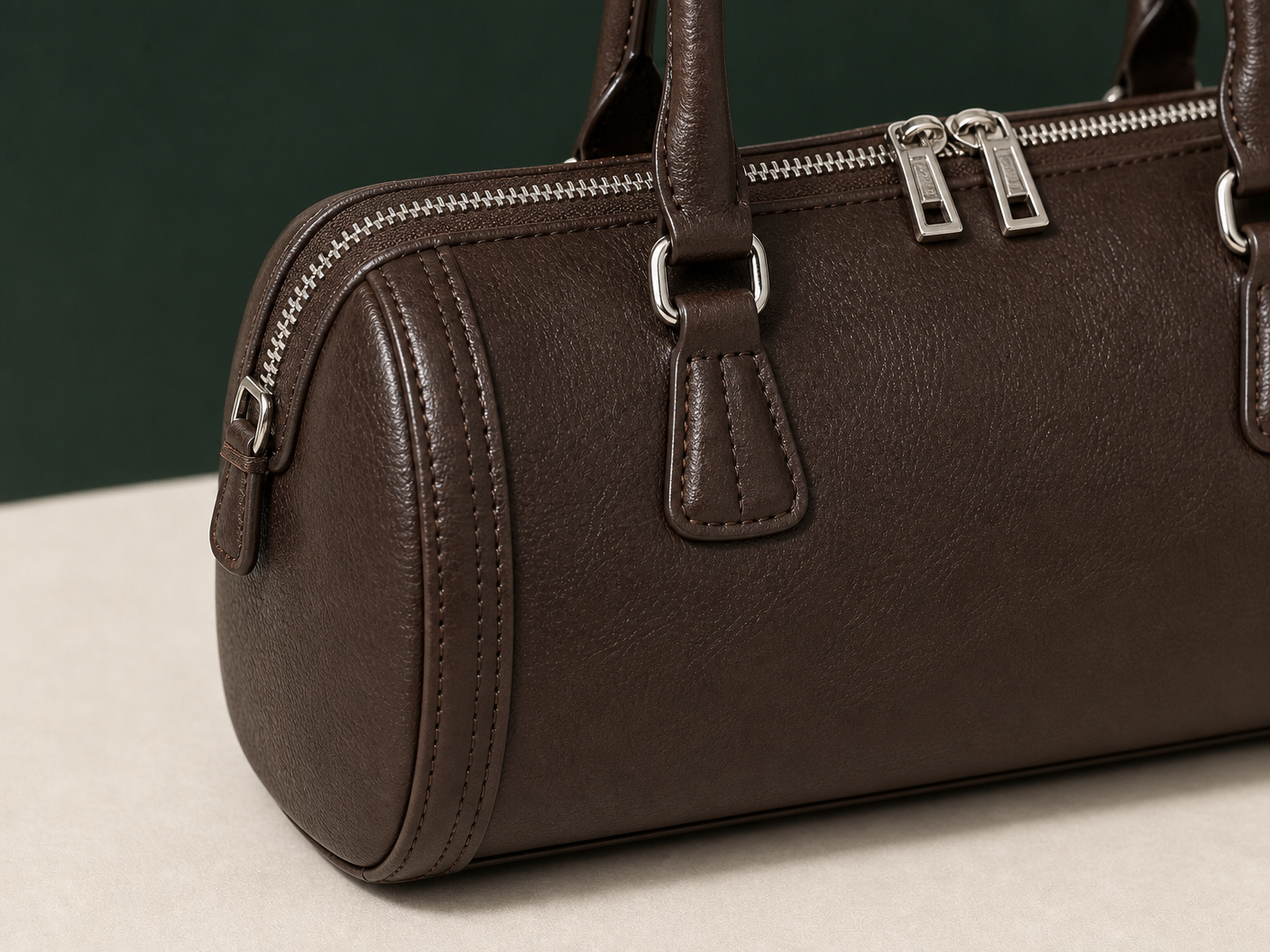 Close-up of BLOOM-102 Barrel Shoulder Collection material texture stitching edge paint and hardware