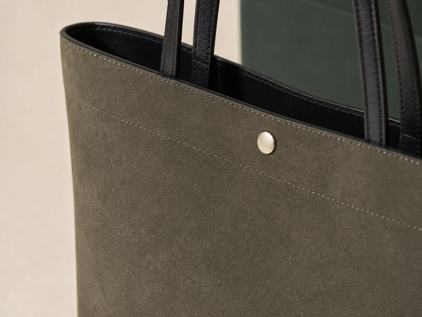 Close-up of BLOOM-106 Moss East-West Shopper material texture stitching edge paint and hardware