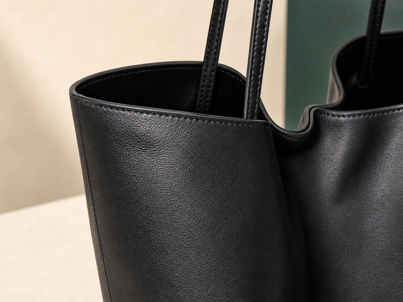 Close-up of BLOOM-205 Large Soft Bucket Tote material texture stitching edge paint and hardware