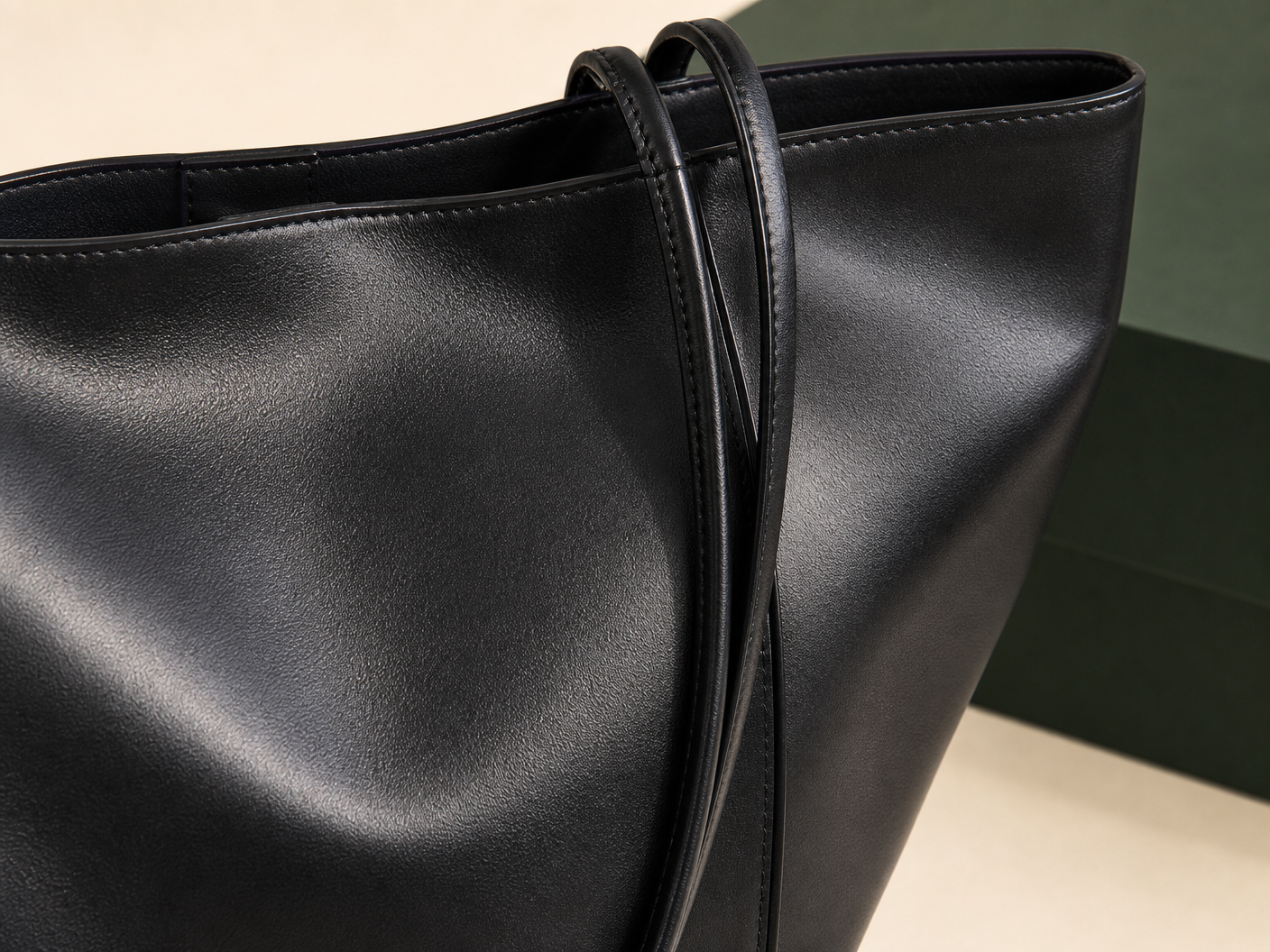 Close-up of BLOOM-206 Compact Soft Tote material texture stitching edge paint and hardware