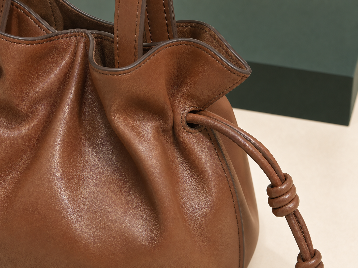 Close-up of BLOOM-301 Ruched Tote Collection material texture stitching edge paint and hardware